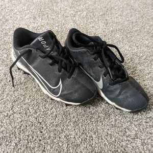 Nike youth baseball cleats, size 13.